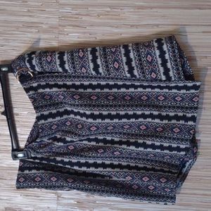 Wrap around style skirt/skort. W22-24. Cute and slimming. Knee length. Pockets